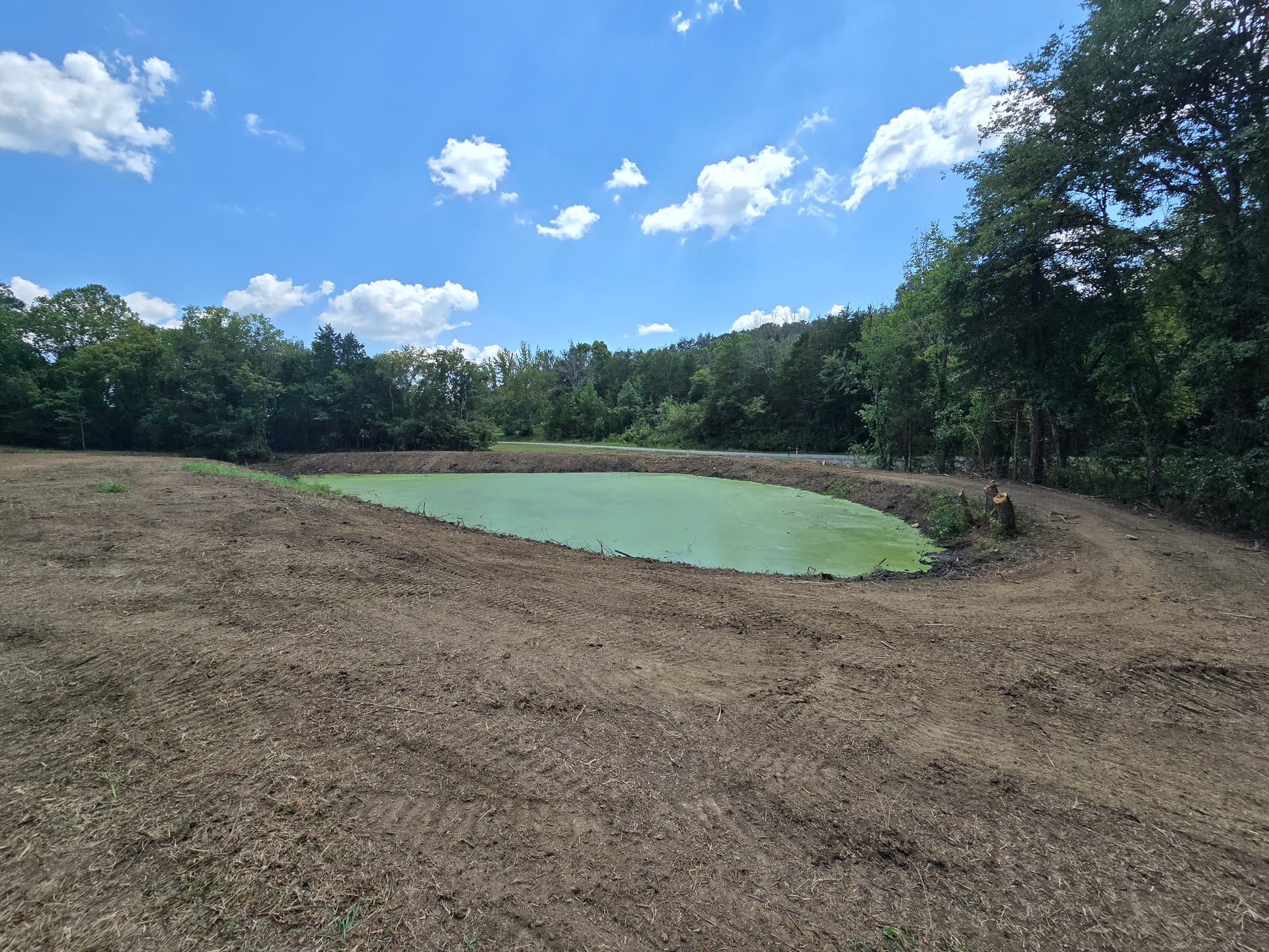 Completed pond with cleared banks