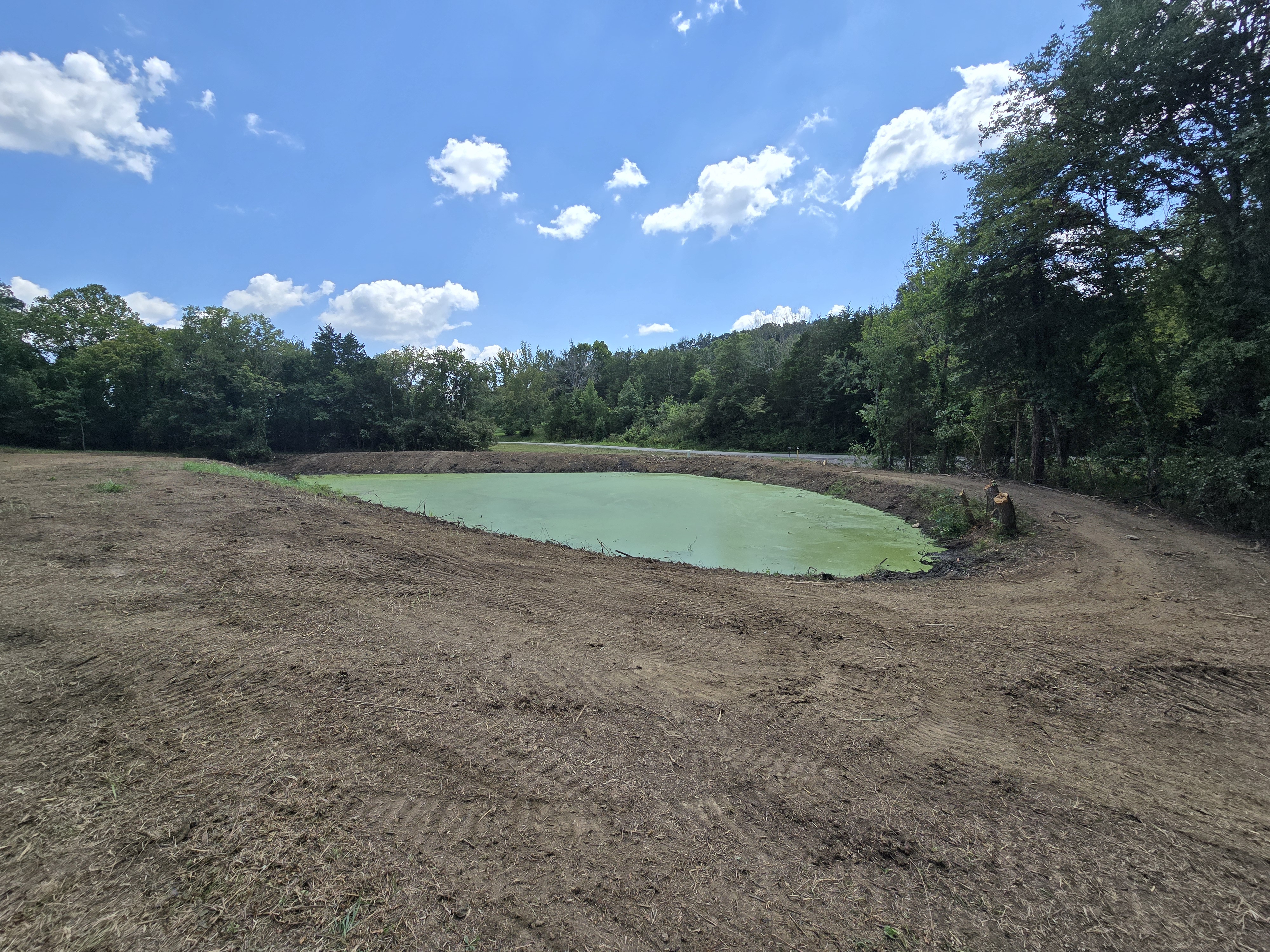 Completed pond with cleared banks